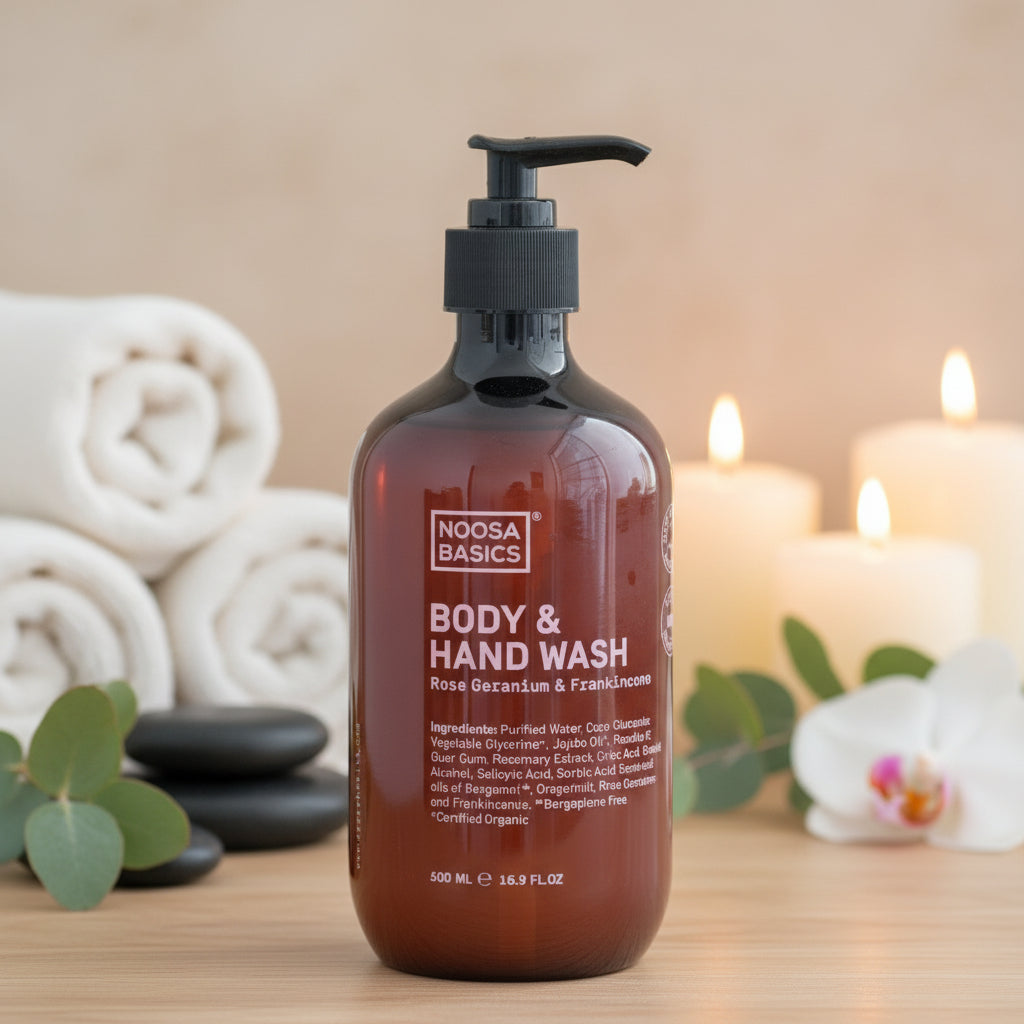 Bottle of Noosa Basics Body & Hand Wash on a wooden surface with a neutral background