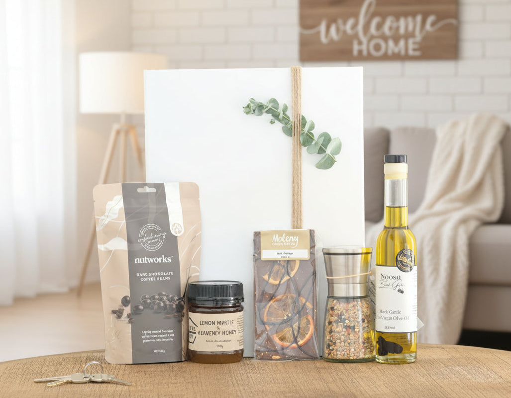Collection of coffee beans, olive oil, and other products on a wooden surface with a neutral background